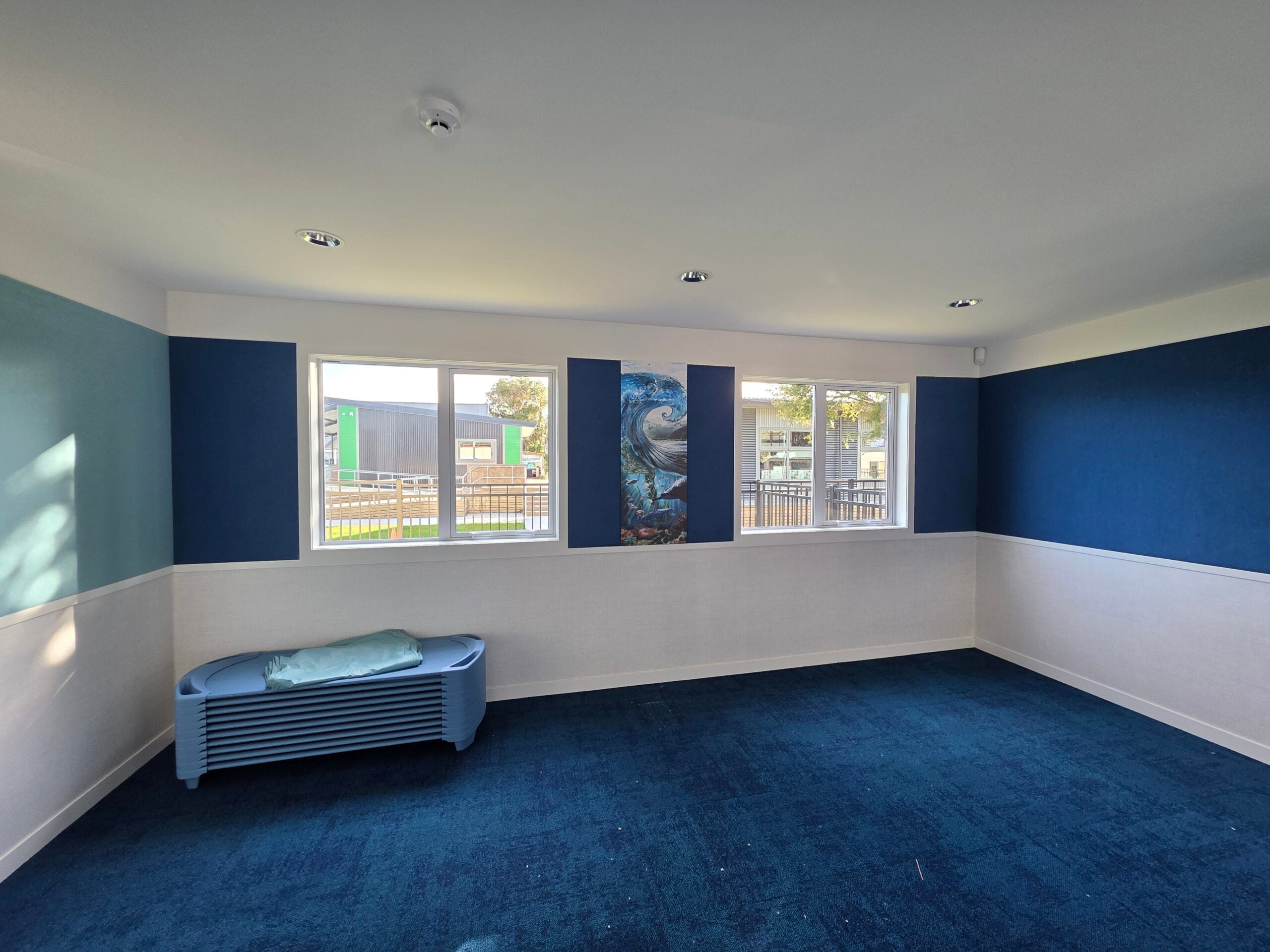 Custom shaped acoustic wall panels in a childcare centre
